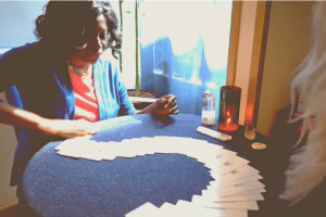 our reader giving a tarot reading