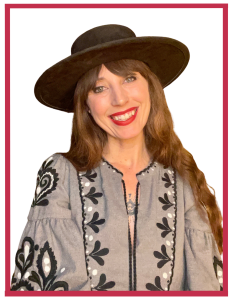 image of a woman with a hat smiling. image has a red border